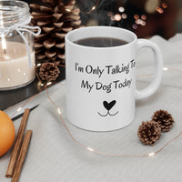 I'm Only Talking To My Dog Today Mug on a table